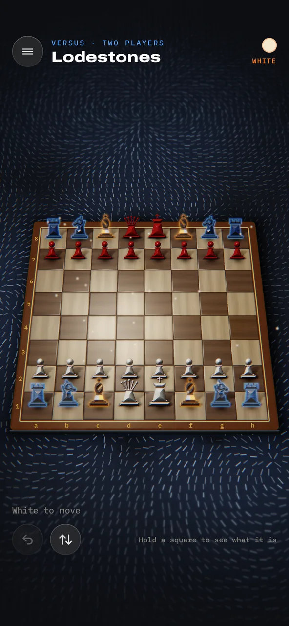 A two-player game on the Lodestones arena, on a walnut board with ivory and red lacquer pieces; the iron pieces keep their blue steel