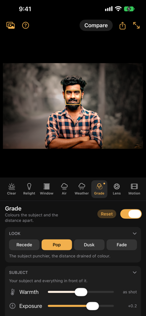 Grade on a man outdoors: the Pop look, his colours kept while the woods behind him are drained to grey