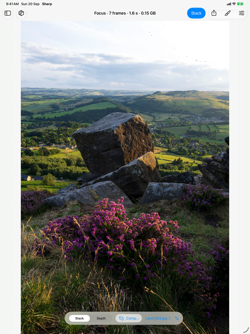 Sharp on an iPad: seven frames of heather, a boulder and a valley merged into one photograph that is sharp from the flowers at your feet to the fields on the horizon