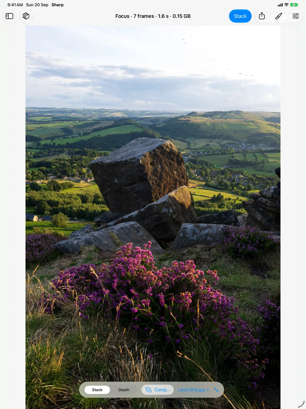 Sharp on an iPad: seven frames of heather, a boulder and a valley merged into one photograph that is sharp from the flowers at your feet to the fields on the horizon